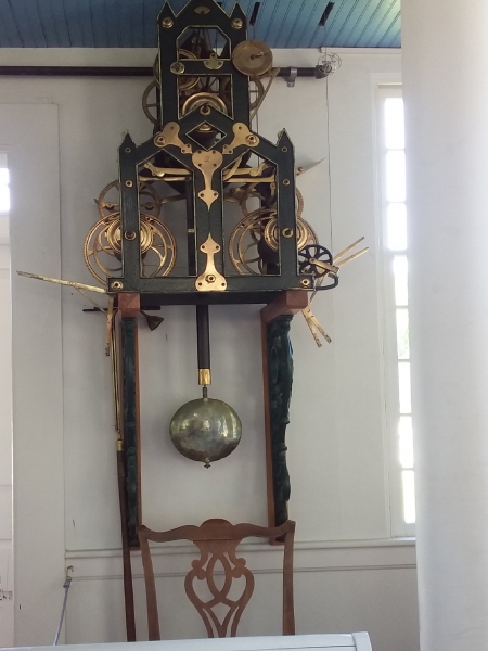 Clock inside church at Boone Village